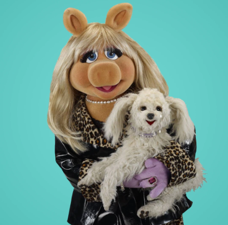 Miss Piggy holding her poodle, Foo-Foo.